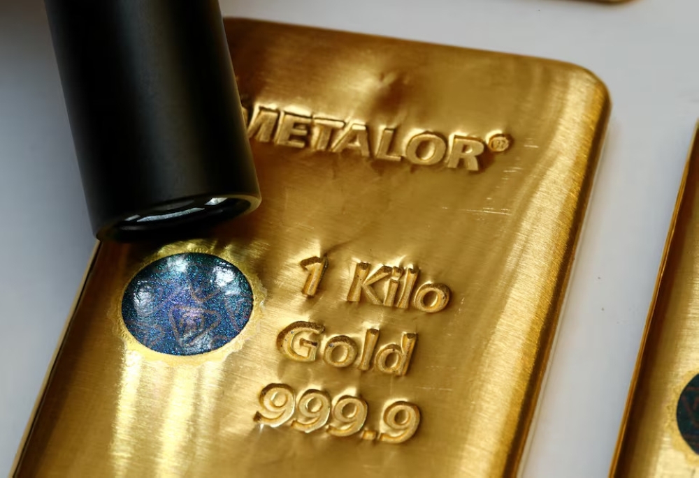 The Sicpa Oasis validator system (bullion protect) is pictured on one kilogram bar of gold at Swiss refiner Metalor in Marin near Neuchatel, Switzerland. — Reuters