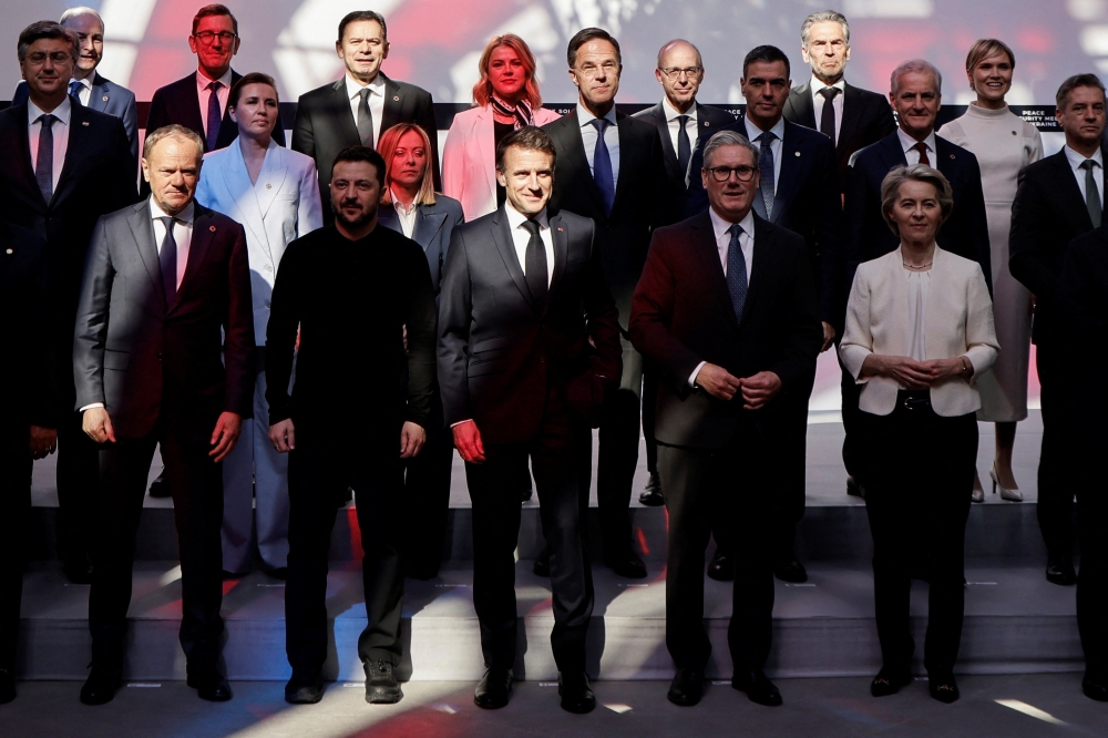 Poland's Prime Minister Donald Tusk, Ukraine's President Volodymyr Zelensky, France's President Emmanuel Macron, Britain's Prime Minister Keir Starmer and European Commission President Ursula Von der Leyen pose during a meeting as part of a summit for 'Coalition of the Willing' at Elysee Palace in Paris. - Reuters 