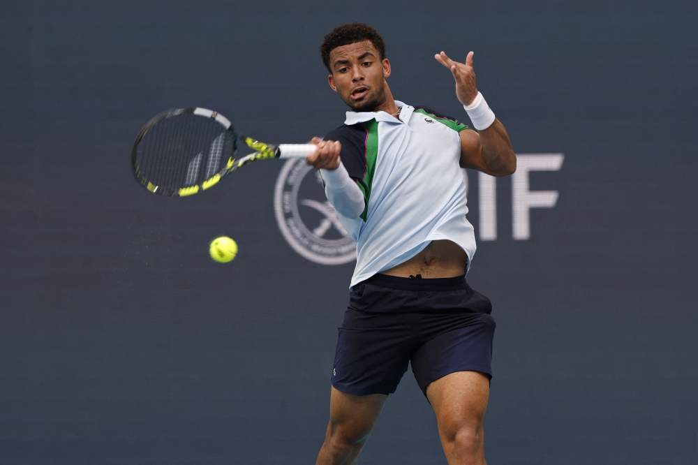 Arthur Fils hits a forehand against Alexander Zverev on day nine of the Miami Open at Hard Rock Stadium. — Reuters