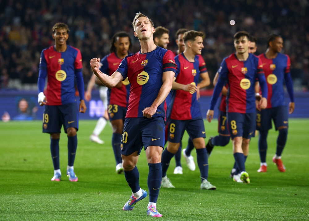 Soccer Football - LaLiga - FC Barcelona v Osasuna - Estadi Olimpic Lluis Companys, Barcelona, Spain - March 27, 2025 FC Barcelona's Dani Olmo celebrates scoring their second goal REUTERS/Albert Gea
