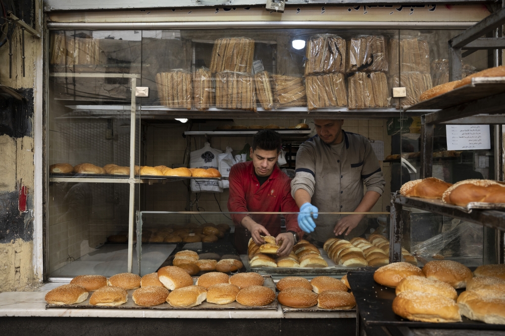 Trays of marook, the sweet bread beloved during Ramadan in Syria, at the Al Jouzeh bakery in Damascus on March 6, 2025. (Kiana Hayeri/The New York Times)