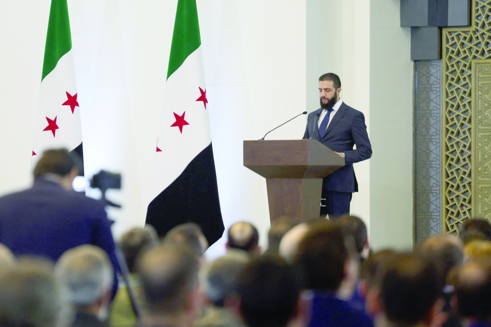 Syria's interim President Ahmed al Sharaa delivers a speech in Damascus. — AFP