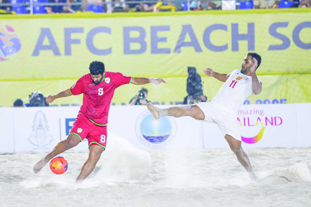Oman and Iran players in action