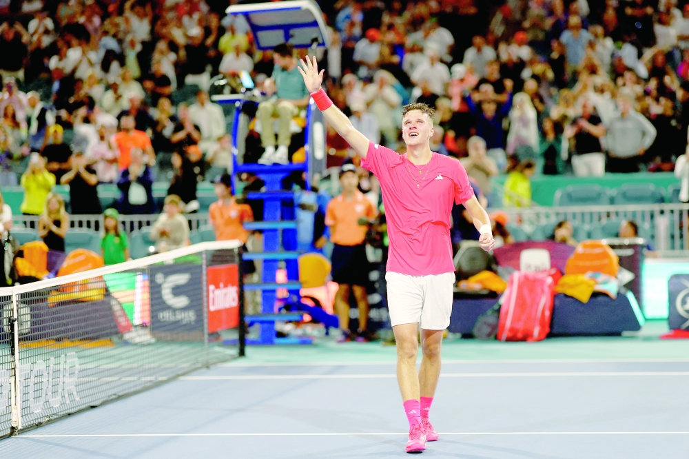Mar 30, 2025; Miami, FL, USA; Jakub Mensik (CZE) waves to the crowd after his match against Novak Djokovic (SRB)(not pictured) in the men's singles championship of the Miami Open at Hard Rock Stadium. Mandatory Credit: Geoff Burke-Imagn Images
