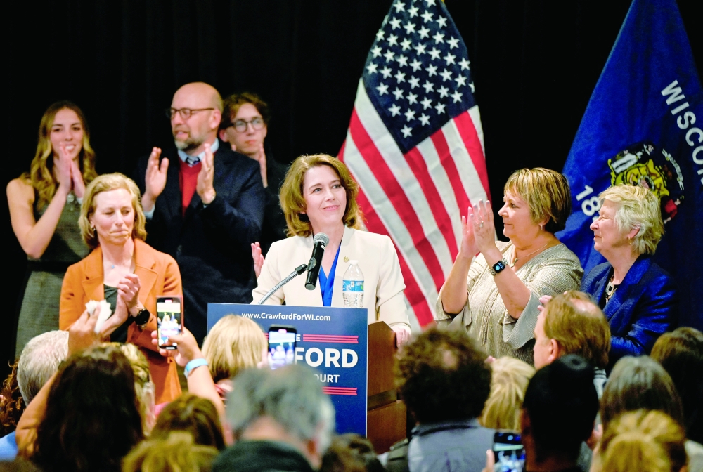 Democrat-backed Wisconsin Supreme Court candidate Judge Susan Crawford speaks to supporters after voters elected her to the state Supreme Court. — Reuters