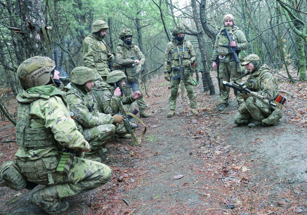 Ukrainian servicemen exercises at a training ground, in Donetsk region, Ukraine. — Reuters