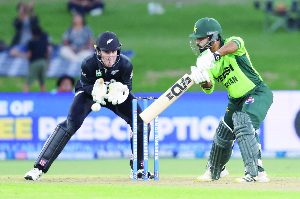 New Zealand Ben Sears fields off his own bowling during the third one day international (ODI) cricket match between New Zealand and Pakistan at Bay Oval in Mount Maunganui. — AFP