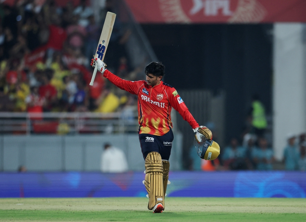 Cricket - Indian Premier League - IPL - Punjab Kings v Chennai Super Kings - Maharaja Yadavindra Singh International Cricket Stadium, New Chandigarh, India - April 8, 2025 Punjab Kings' Priyansh Arya celebrates after reaching his century REUTERS/Anushree Fadnavis
