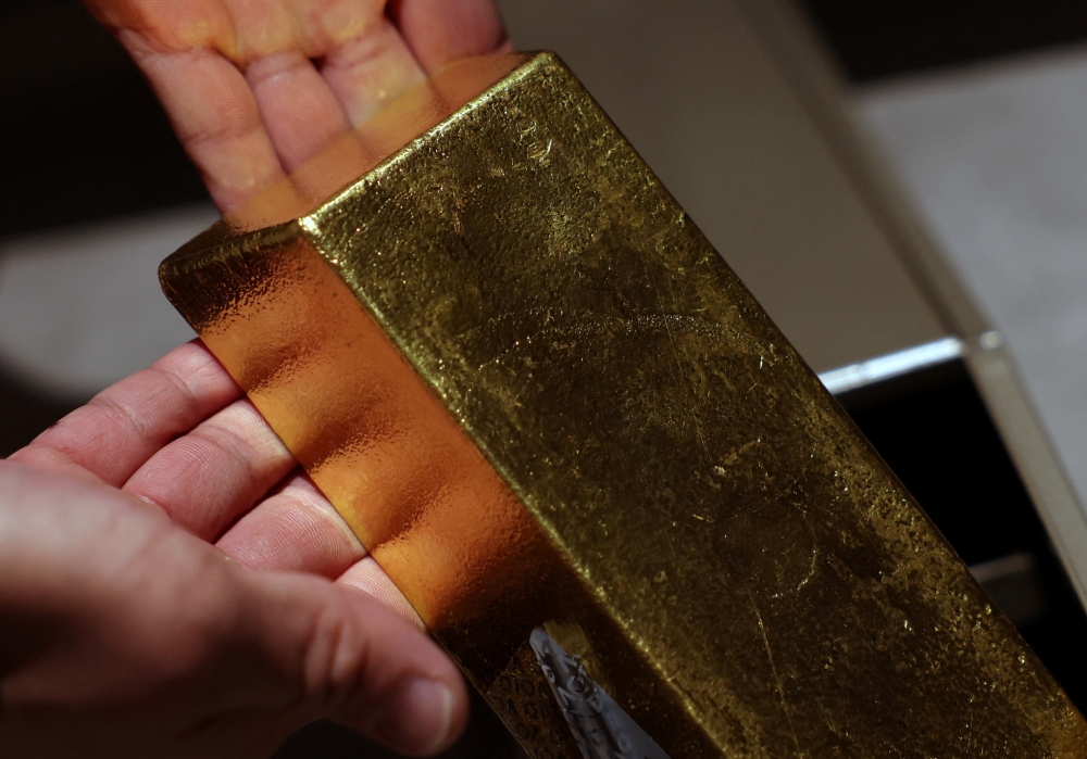 A gold bullion is displayed in The Reserve vault, operated by Silver Bullion Pte Ltd, in Singapore on Friday. — Reuters