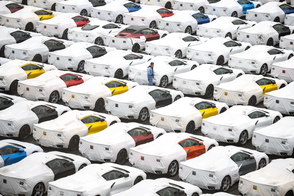 New vehicles are parked at Daikoku Pier in Yokohama, south of Tokyo on Friday. — AFP