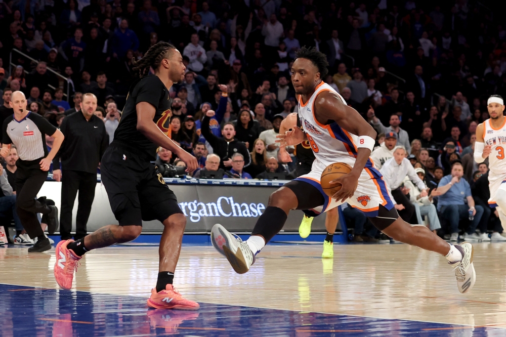 New York Knicks forward OG Anunoby (8) drives to the basket against Cleveland Cavaliers guard Darius Garland (10) during the fourth quarter at Madison Square Garden. — Reuters
