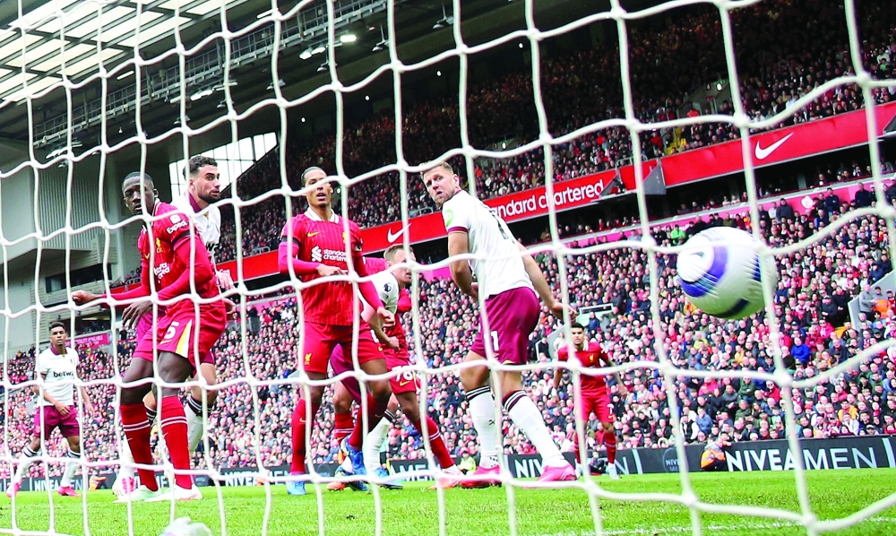 Liverpool's Virgil van Dijk scores their second goal. — Reuters