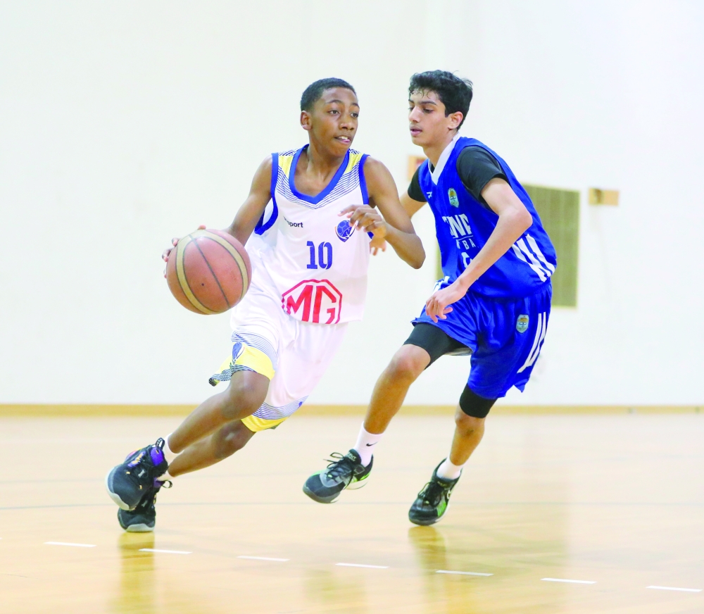 Al Amerat and Nizwa players fight for the ball. — Ammar Al Musafir