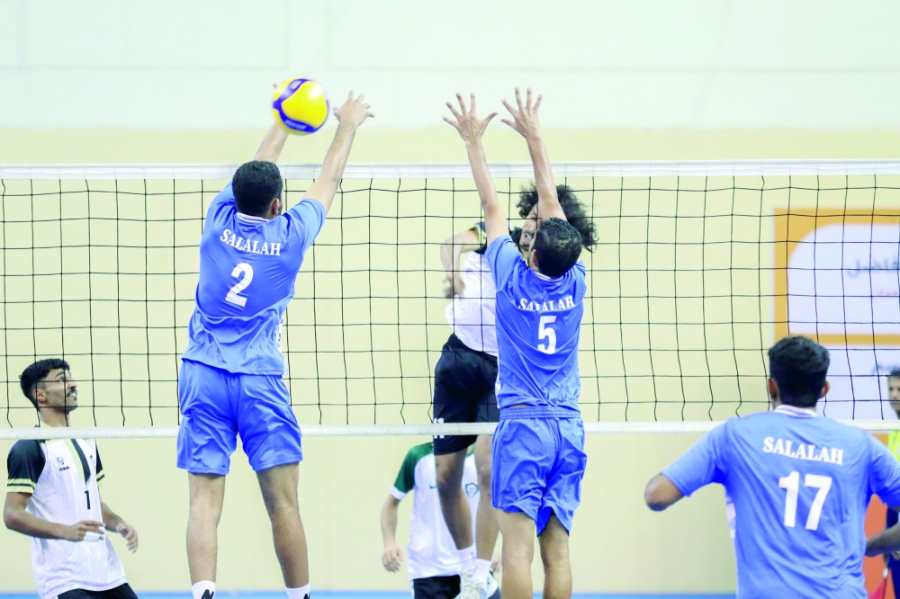 Salalah players block a smash from Taqah.