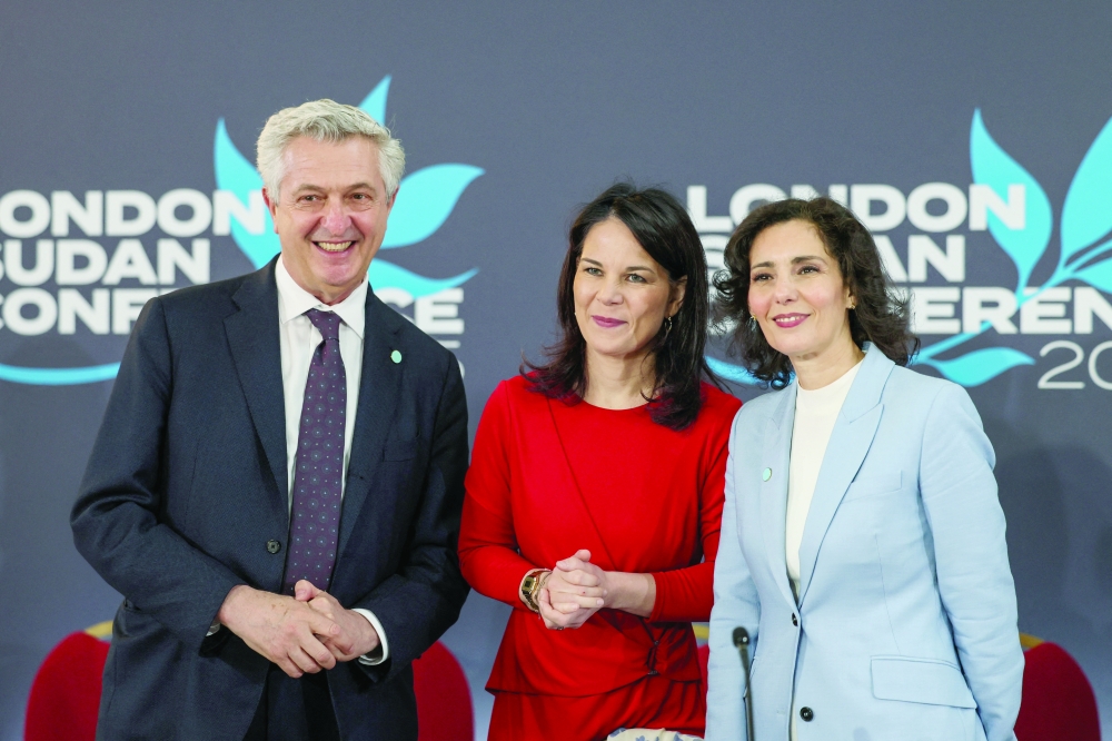 Filippo Grandi, United Nations High Commissioner for Refugees, German Foreign Minister Annalena Baerbock and Hadja Lahbib, European Commissioner for Preparedness, Crisis Management and Equality, attend the London Sudan conference, marking the two-year anniversary of the Sudan conflict in London. - Reuters