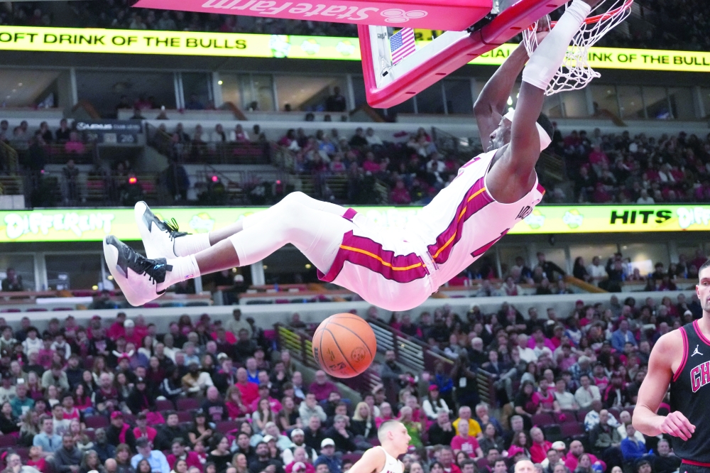 Miami Heat centre Bam Adebayo (13) dunks the ball against the Chicago Bulls during the second half at United Center. — Reuters