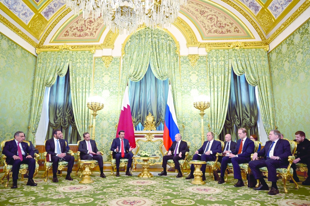 Members of the delegations, led by Russia's President Vladimir Putin and Qatar's Emir Shaikh Tamim bin Hamad al Thani, attend a meeting at the Kremlin in Moscow. — Reuters
