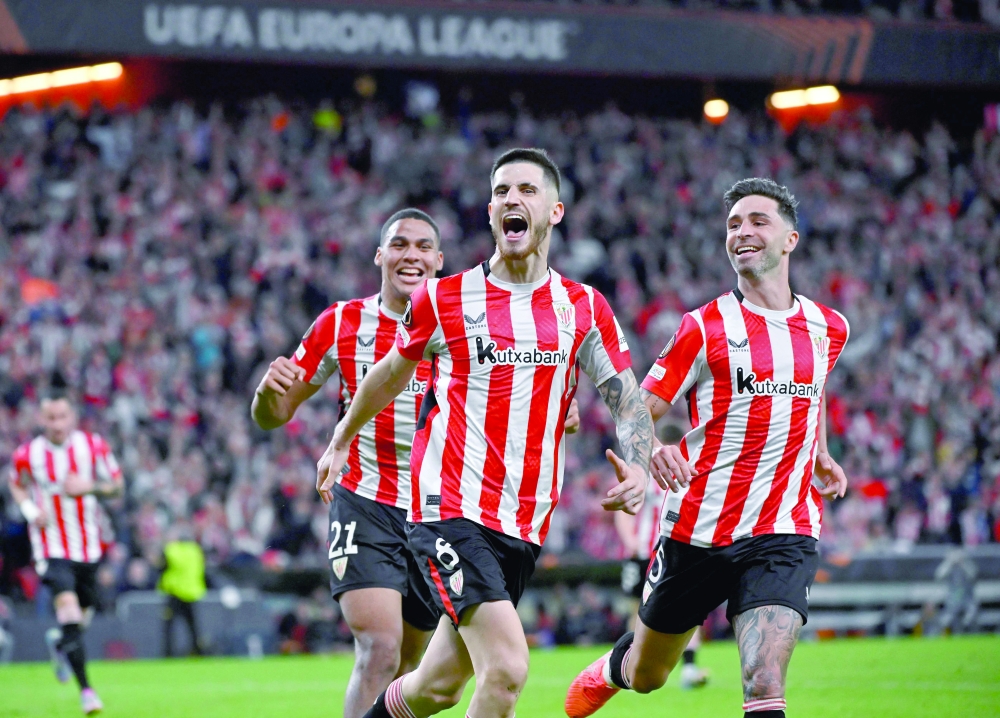 Athletic Bilbao's Spanish midfielder #08 Oihan Sancet (C) celebrates scoring his team's first goal during the UEFA Europa League quarter final second leg football match between Athletic Club Bilbao and Glasgow Rangers, at the San Mames stadium in Bilbao on April 17, 2025. (Photo by ANDER GILLENEA   / AFP)

