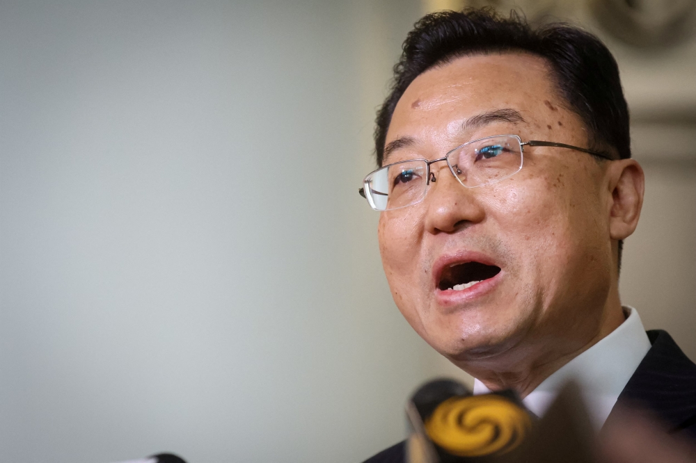 Xie Feng, China's new ambassador to the US, addresses the media as he arrives at JFK airport in New York City. — Reuters