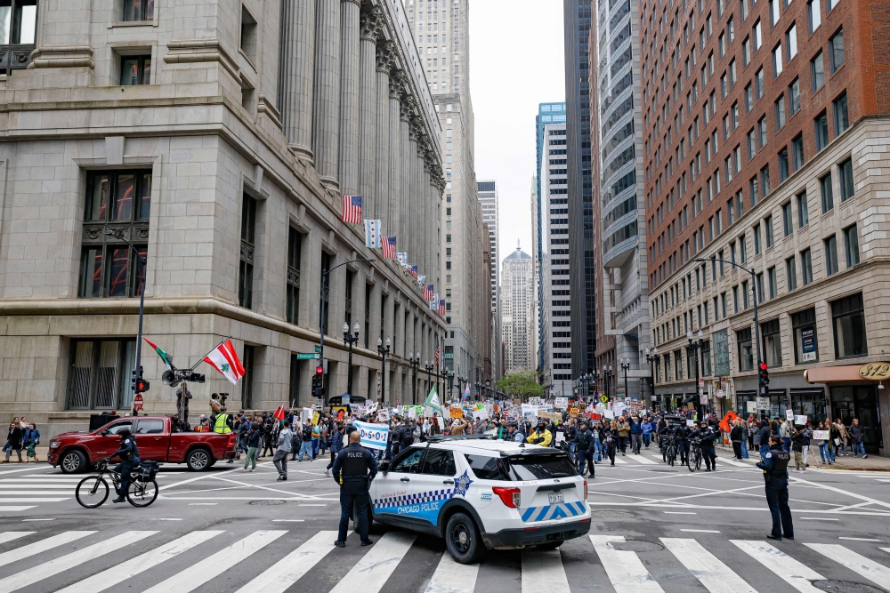 Demonstrators gather during a rally 
