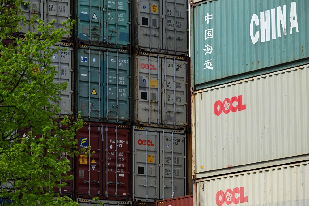 Containers are stacked at a transshipment station in Frankfurt