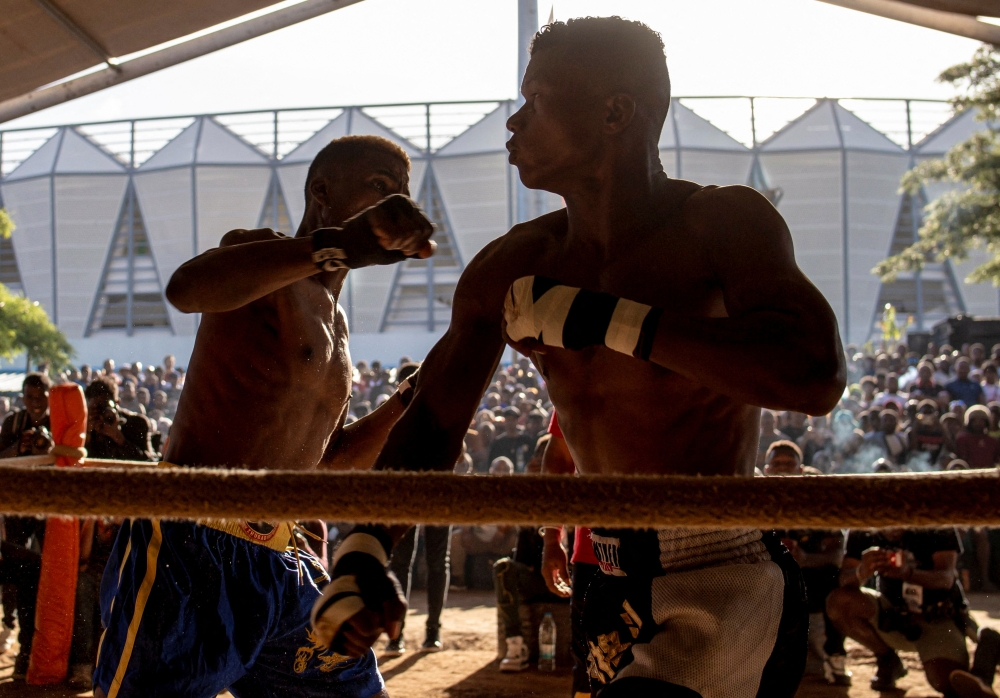 Moraingy fighters battle in the "Moraingy Iarivo" sports event, a traditional Madagascan martial art fighting competition that was practised as training for war and as an initiation rite marking the passage to adulthood, at a stadium in Antananarivo, Madagascar April 6, 2025. REUTERS/Zo Andrianjafy
