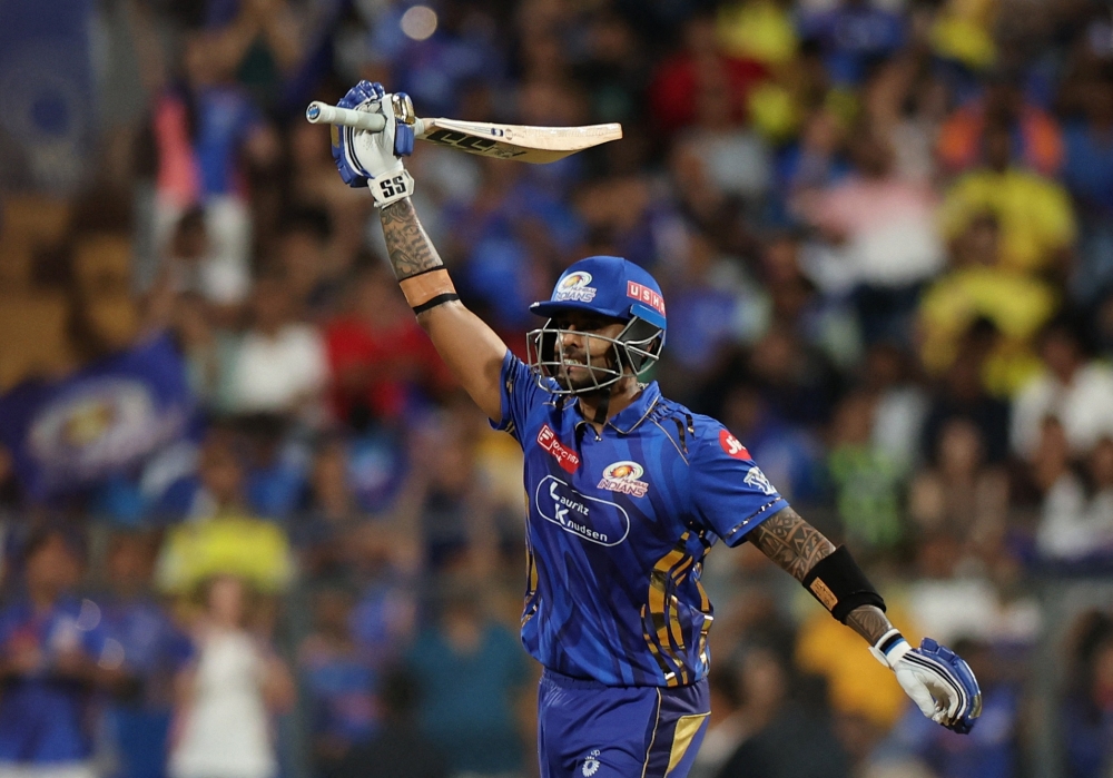 Cricket - Indian Premier League - IPL - Mumbai Indians v Chennai Super Kings - Wankhede Stadium, Mumbai, India - April 20, 2025 Mumbai Indians' Suryakumar Yadav celebrates after reaching his half century REUTERS/Francis Mascarenhas