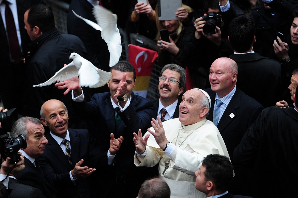 Pope Francis frees doves at the Istanbul's Holy Spirit Cathedral as part of a three-day trip in Turkiye. — AFP