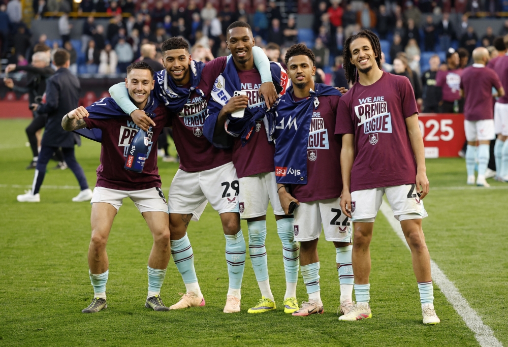 Burnley players celebrate after being promoted to the Premier League. — Reuters