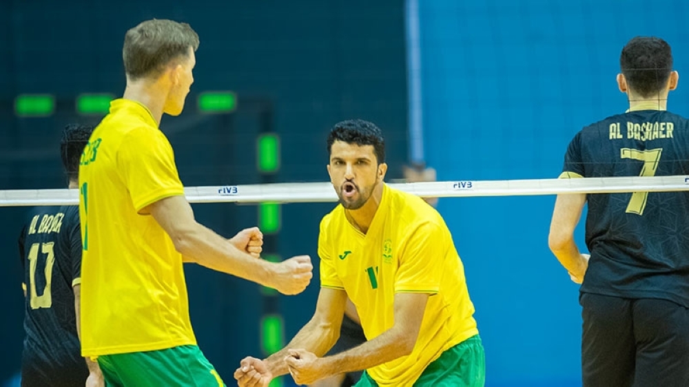 Seeb players celebrate after a point.