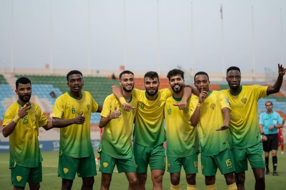 Al Khabourah players celebrate after the match.