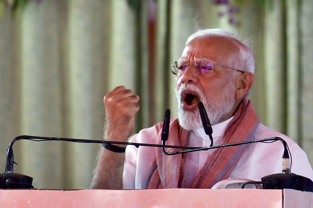 India's Prime Minister Narendra Modi addresses a gathering in Madhubani district of Bihar state. - AFP
