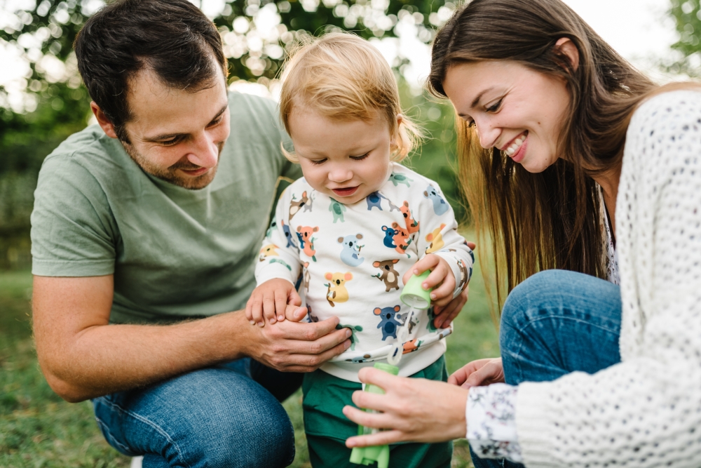 Family,Blows,Soap,Bubbles.,Toddler,Little,Cute,Son,,Dad,,Mom
