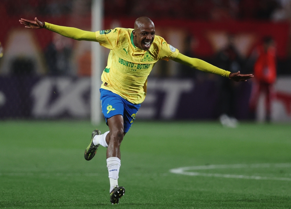 Mamelodi Sundowns' Khuliso Mudau celebrates after the match. — Reuters