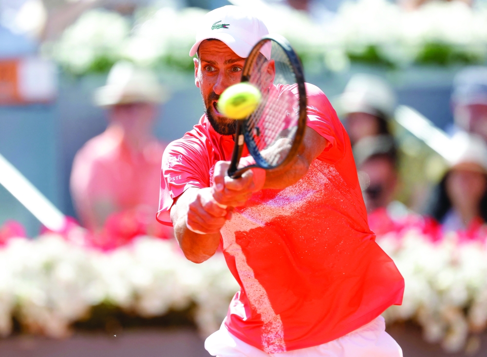 Serbia's Novak Djokovic in action during his round of 64 match against Italy's Matteo Arnaldi. — Reuters