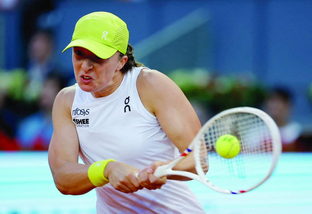 Poland's Iga Swiatek in action during her round of 32 match against Czech Republic's Linda Noskova. — Reuters
