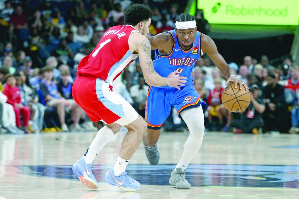 Oklahoma City Thunder guard Shai Gilgeous-Alexander (2) drives to the basket as Memphis Grizzlies guard Scotty Pippen Jr (1) defends. — Reuters