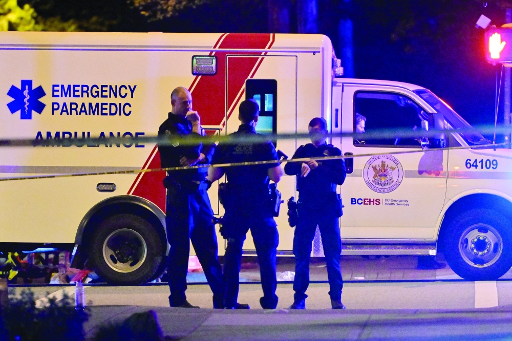 An ambulance is parked at the site of the Lapu Lapu party, in Vancouver, Canada. — AFP