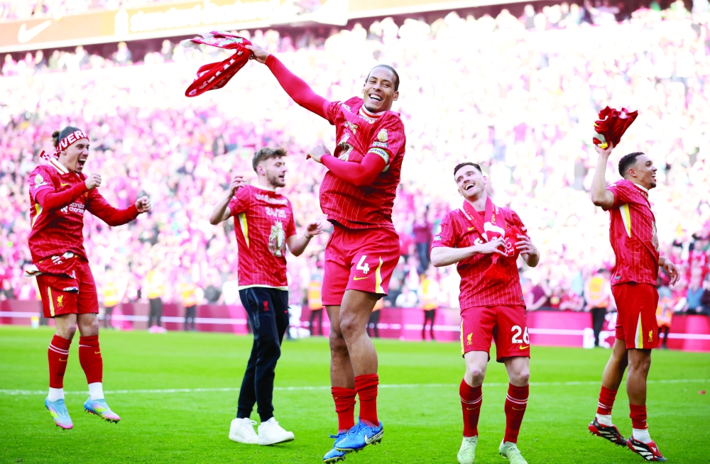 Virgil van Dijk celebrates after winning the Premier League. — Reuters