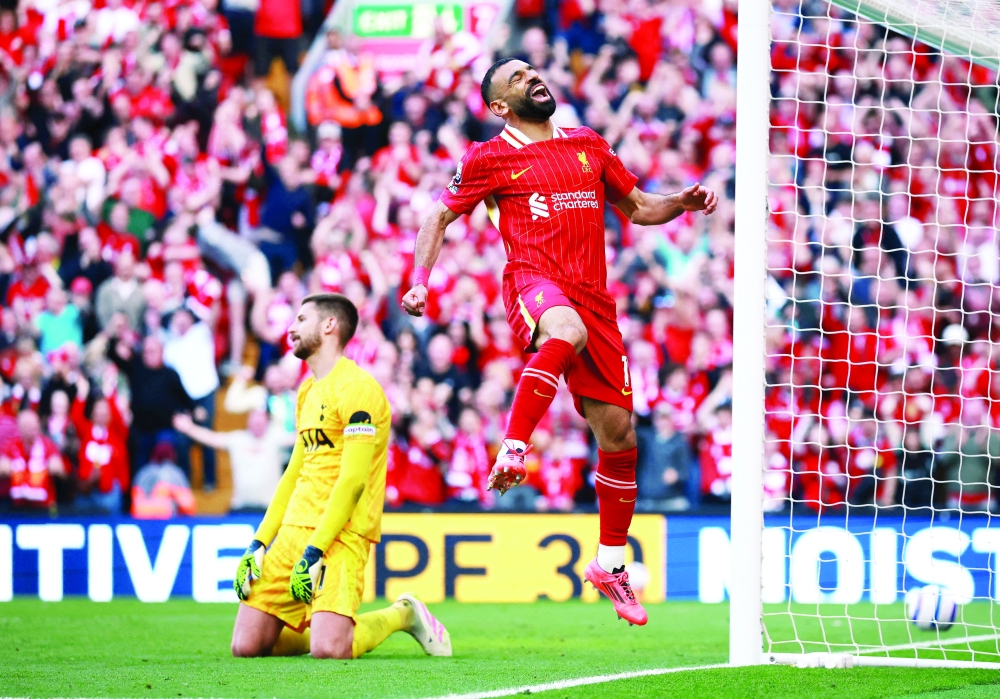 Liverpool's Mohamed Salah celebrates scoring their fourth goal REUTERS