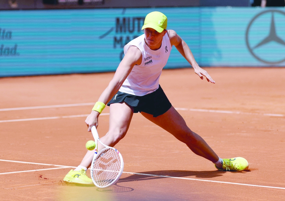 Poland's Iga Swiatek in action during her round of 16 match against Russia's Diana Shnaider. — Reuters