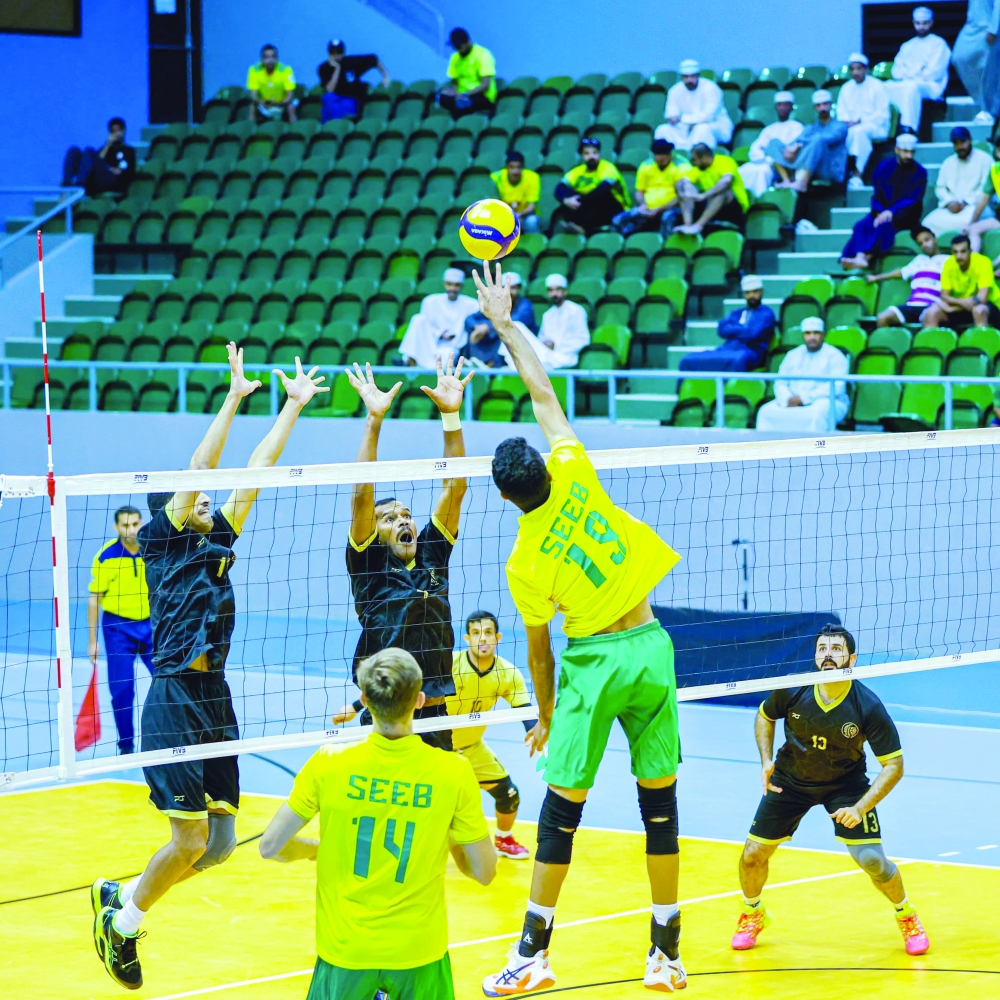 Seeb make a smash past Al Bashayer defence.