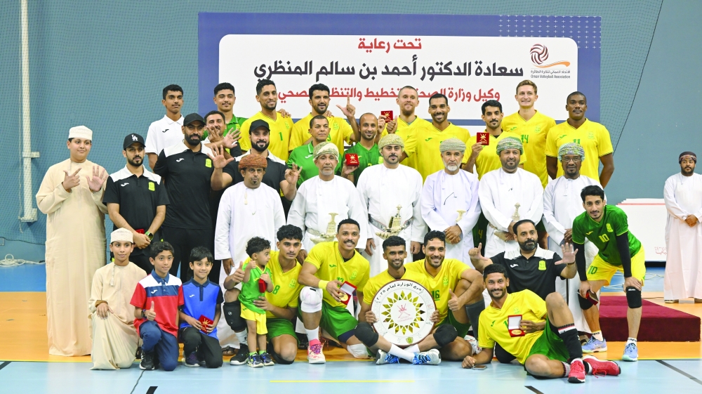 Seeb players celebrate with the Ministry’s Shield after beating Majees in the final. — Abdulwahid al Hamadani