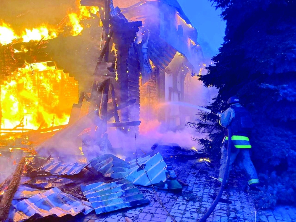 A rescuer works at a site of a Russian drone strike, in Dnipro, Ukraine. — Reuters