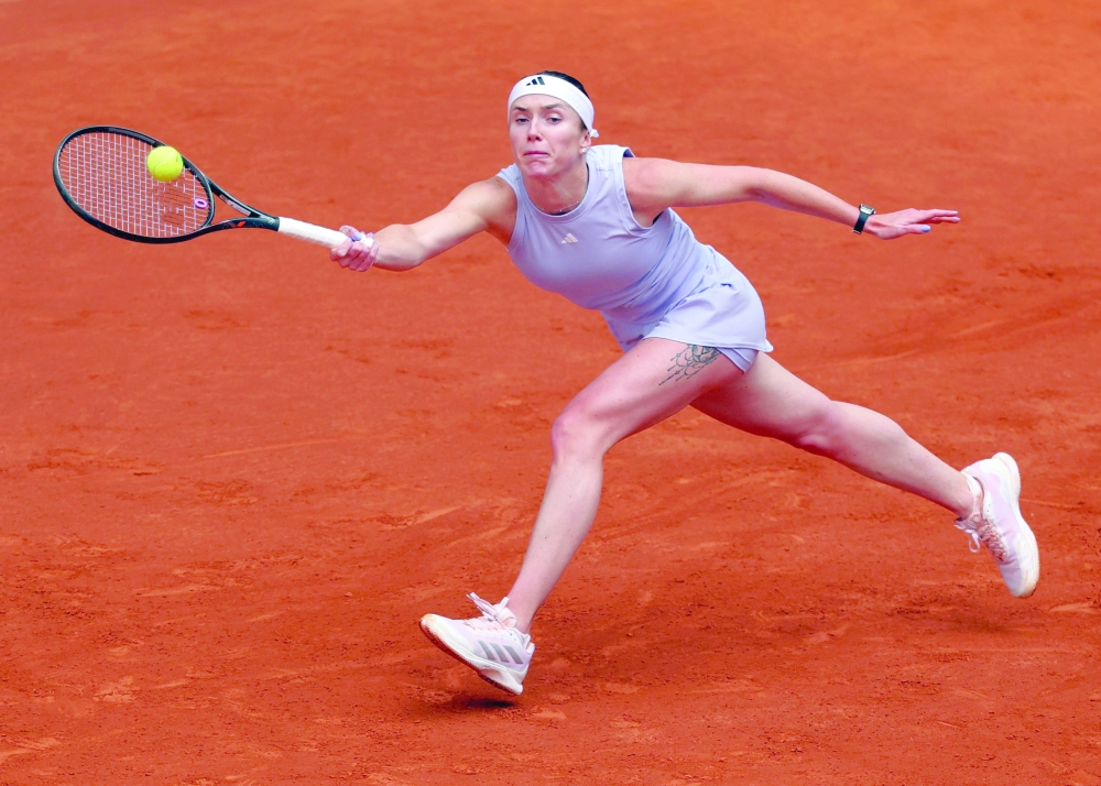 Ukraine's Elina Svitolina returns the ball to Japan's Moyuka Uchijima during their 2025 WTA Tour Madrid Open tennis tournament match at the Caja Magica in Madrid, on April 30, 2025. (Photo by Pierre-Philippe MARCOU / AFP)