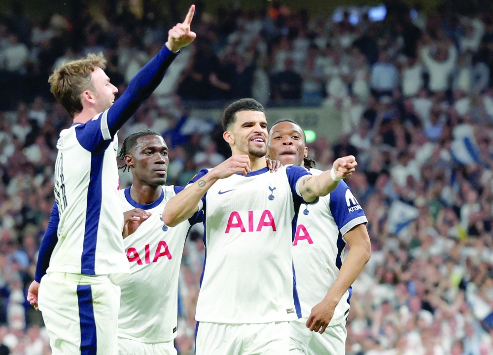 Tottenham Hotspur's Dominic Solanke celebrates scoring their third goal with Yves Bissouma, James Maddison and Destiny Udogie. — Reuters