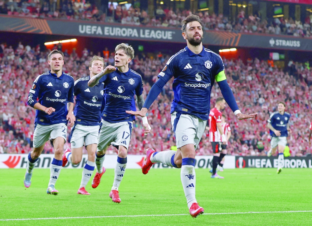 Manchester United's Bruno Fernandes celebrates scoring their second goal. — Reuters