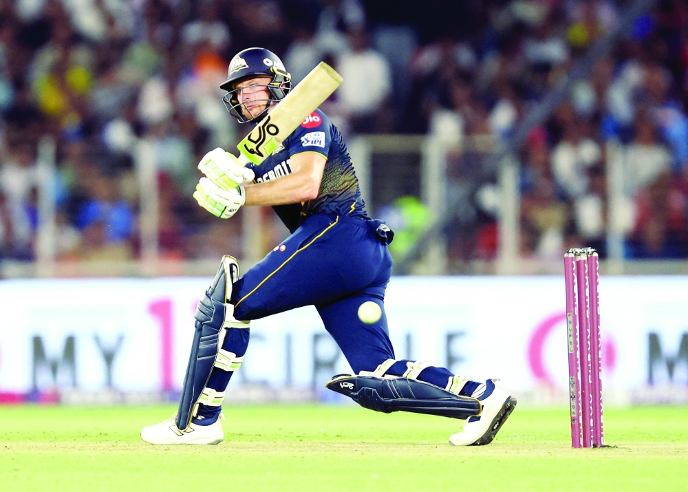 Gujarat Titans' Jos Buttler in action. — Reuters