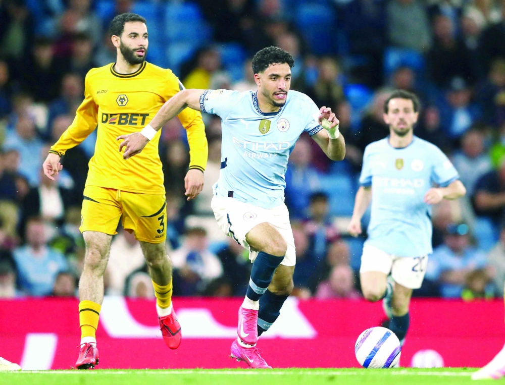 Manchester City's Omar Marmoush in action with Wolverhampton Wanderers' Rayan Ait-Nouri. — Reuters
