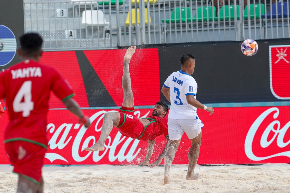 Oman and El Salvador players in action